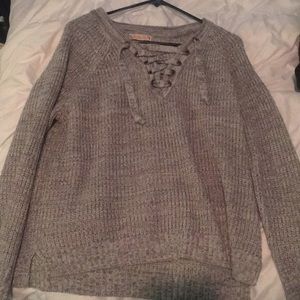 Grey and white cross tie sweater
